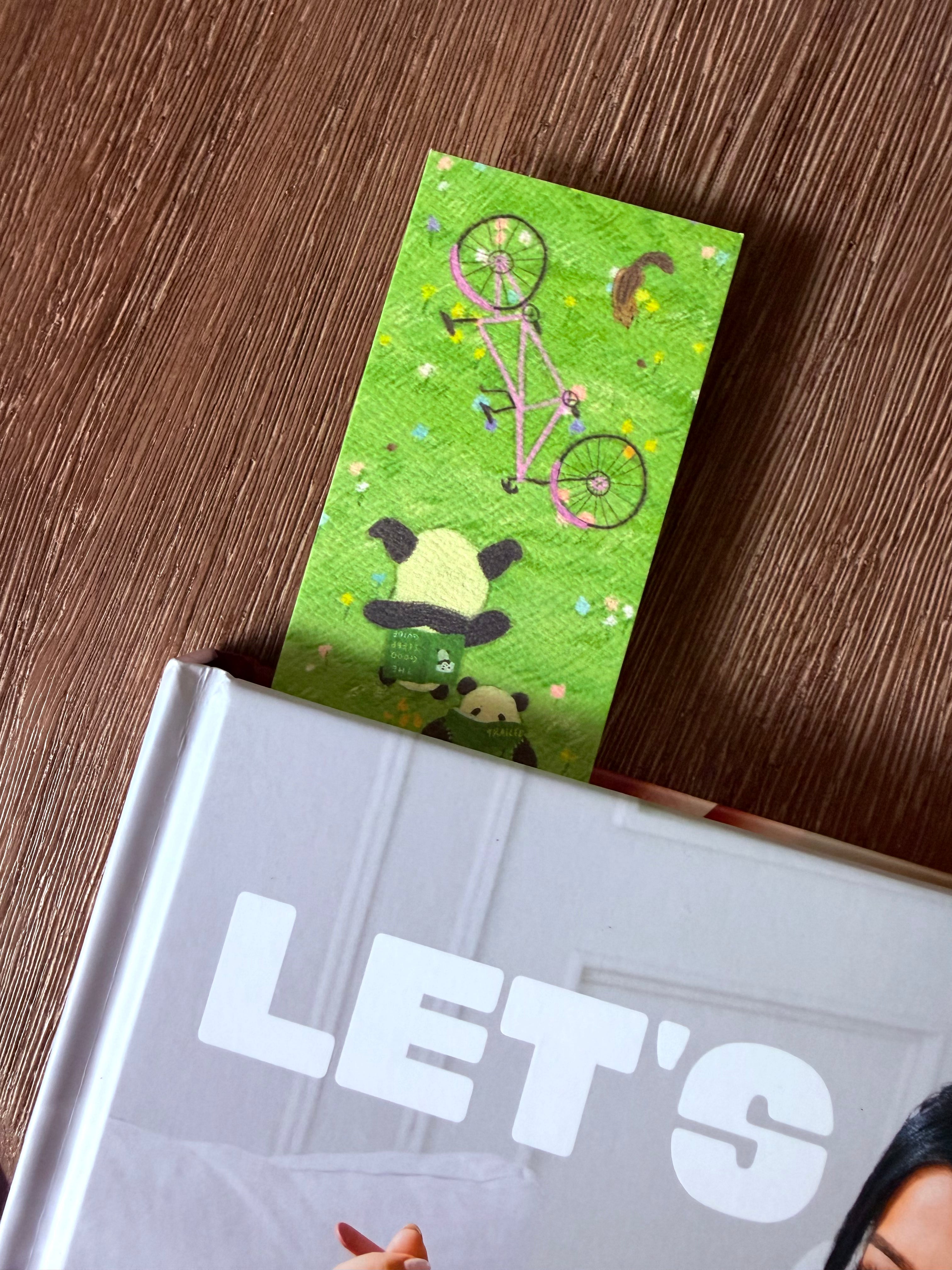 Pandas on a book-nic Bookmark