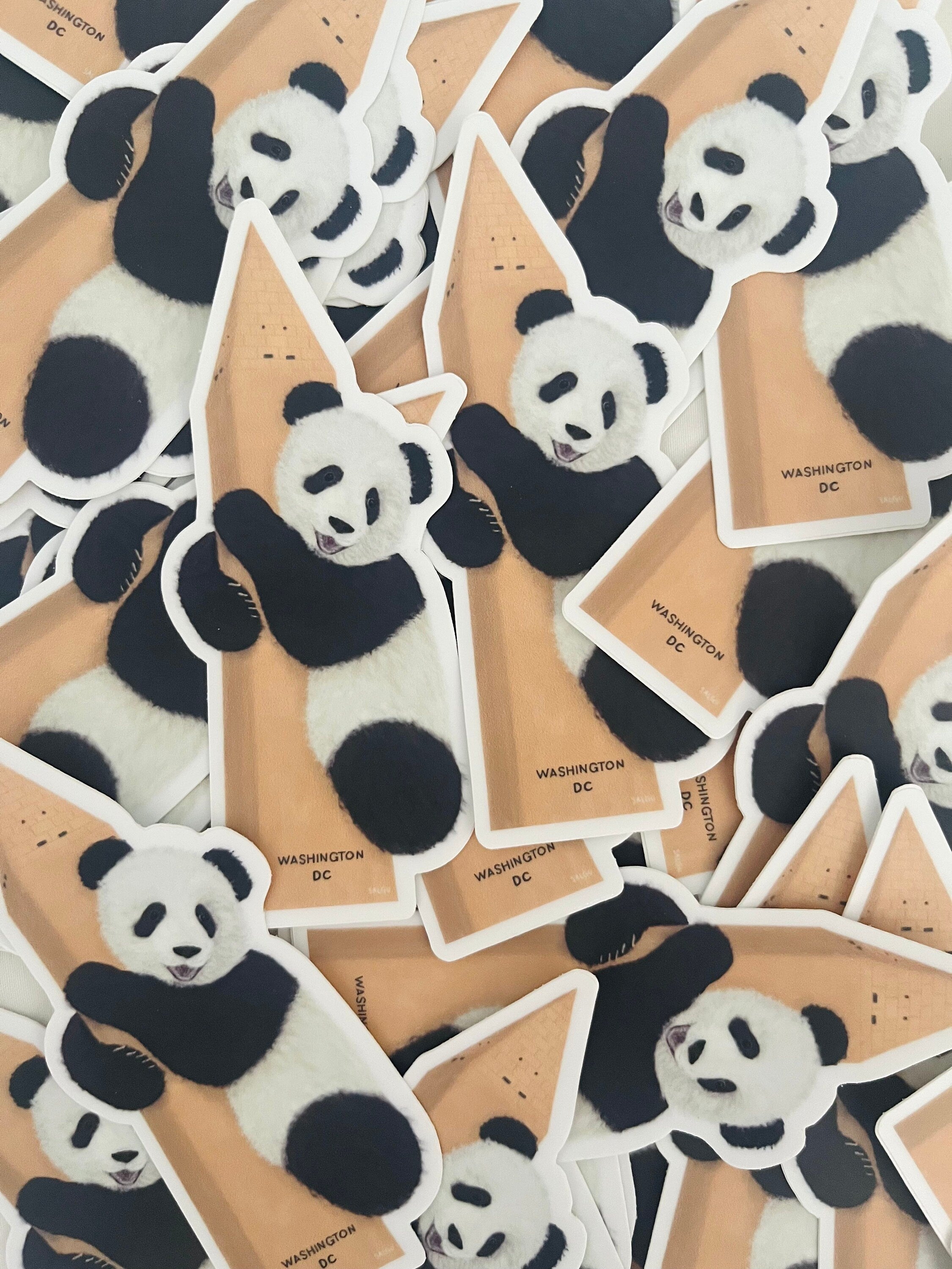 Panda Hugging the Monument Sticker